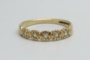 A 9ct gold ring set with five white stones, 1.6g, O