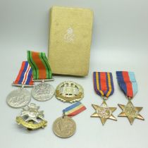A group of WWII medals including 1939-1945 Star, Burma Star, Sherwood Foresters and Northamptonshire