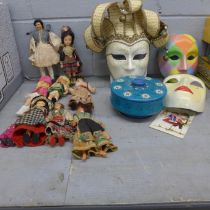 A collection of costume dolls, three Venetian masks and a retro biscuit tin **PLEASE NOTE THIS LOT