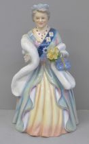 A Royal Doulton limited edition figure, Queen Elizabeth The Queen Mother, one finger tip missing and