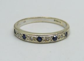 A 9ct gold ring set with sapphires and diamonds, 2.2g, O