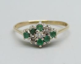 A 9ct gold, emerald and diamond cluster ring, 1.9g, Q