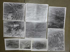 A collection of 12 x 9.25" photographs of Northamptonshire, a few smaller, aerial photographs of