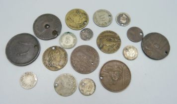 A collection of assorted British and foreign coinage, drilled