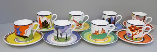 A set of eight Wedgwood Bradford Exchange coffee cans and saucers, Centenary of Clarice Cliff