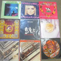 Nine LP records and 12" singles including The Beatles and Thin Lizzy