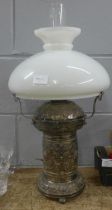 An American Wanzer silver plated table lamp, with funnel and opaque glass shade, small chip to shade