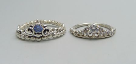 Two silver stone set Pandora rings, both marked S925 ALE, blue stone ring size S, white stone ring