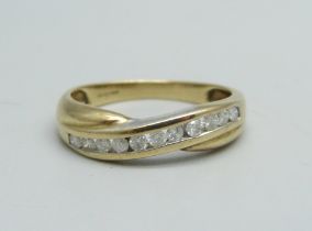 A 9ct gold ring set with diamonds, 2.1g, M