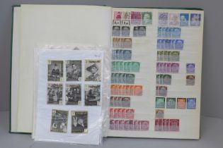 A stamp album contaning German stamps and a small collection of Winston Churchill stamps