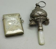 A silver vesta, a/f and a silver baby's rattle, gross weight 30g