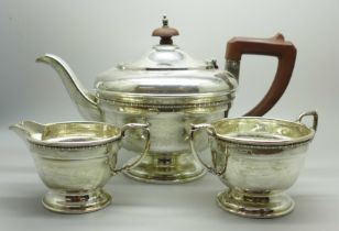 A silver three piece tea service, Birmingham 1933, 614g