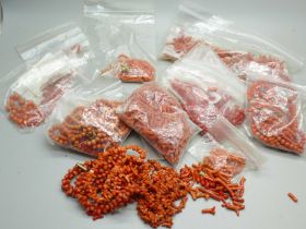 A large collection of loose coral beads for stringing, 400g