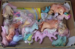 Twenty-one original 1980s My Little Pony toys with book and accessories