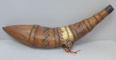 A Dahomey Amazons women warrior horn and leather powder flask, mid/late 1800s