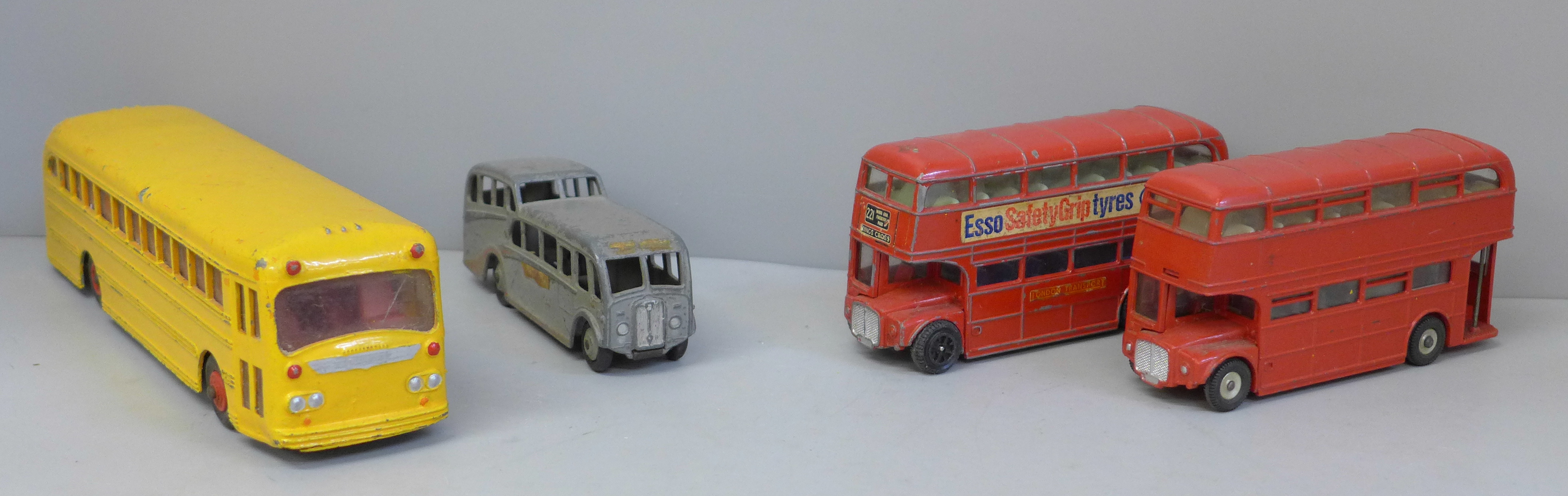 Four vintage buses, Dinky Supertoys Wayne Bus, two Dinky Toys Routemaster buses, and a Dinky Toys