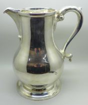 A large silver pitcher, Mappin & Webb, London 1987, 213mm tall, 1080g