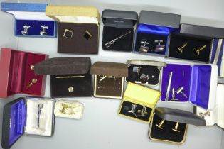 Two boxes containing silver rings, charms and costume jewellery