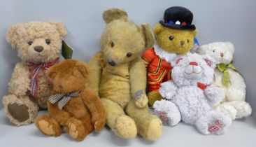A collection of Teddy bears including one vintage and two Harrods bears