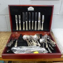 A canteen of cutlery and a bag of mixed flatware **PLEASE NOTE THIS LOT IS NOT ELIGIBLE FOR