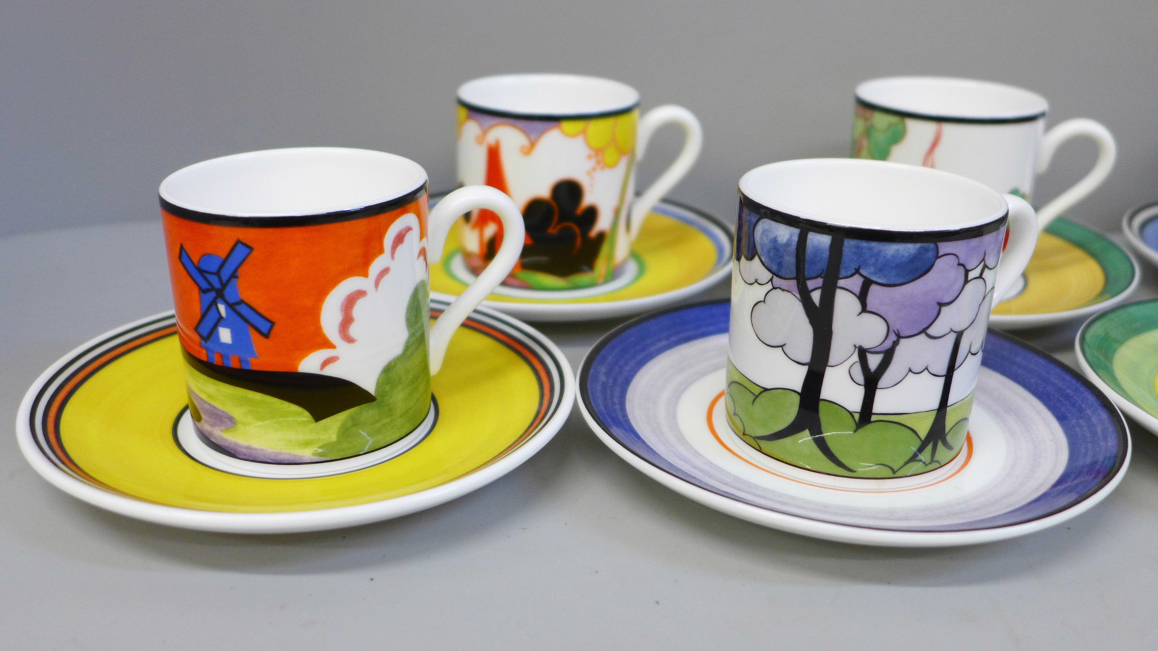 A set of eight Wedgwood Bradford Exchange coffee cans and saucers, Centenary of Clarice Cliff - Image 2 of 4