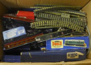 A collection of Hornby Dublo model rail track, locomotives, wagons, etc.