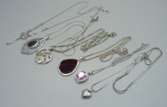 Six silver pendants and chains, 43g
