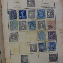 A Stanley Gibbons International Stamp Album and two others