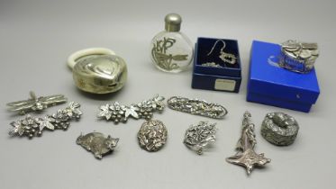 A collection of brooches, a Silver Scenes pill box, baby's teething ring, etc.