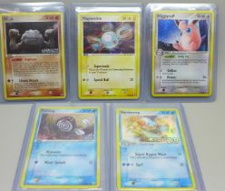 Five vintage rare holographic Pokemon cards