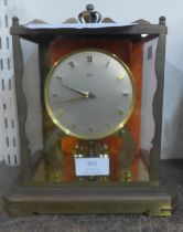 A Schatz 1000 day torsion clock with four ball pendulum
