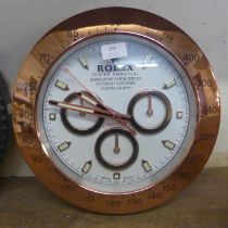 A Rolex style dealers circular wall clock