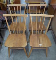 A set of four Ercol elm and beech 391 model chairs