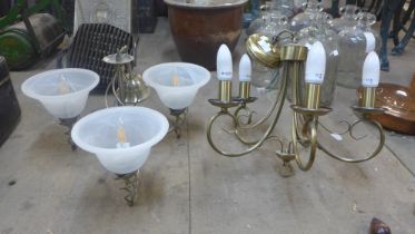 Two gilt metal chandeliers