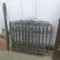 Four wrought steel garden gates and a panel