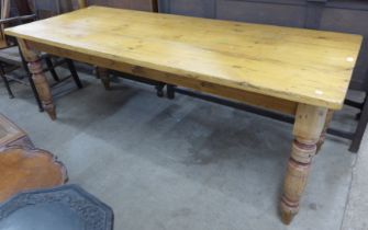A Victorian style pine farmhouse kitchen table