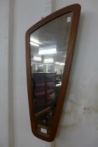 A teak asymmetrical framed mirror and a cheval mirror