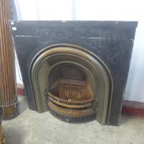 A Victorian cast iron fire surround