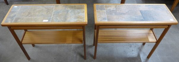 A pair of Danish teak and tiled top coffee tables