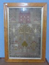 A Victorian sampler by Clara Clipstone, aged 11, dated 1888, framed