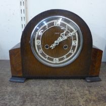 An Art Deco Enfield oak mantel clock