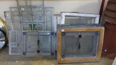 Assorted stained glass windows and window panes