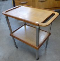 A Danish teak and chrome cocktail trolley