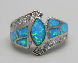 A silver, synthetic opal and white stone ring, P/Q