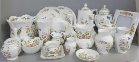 A collection of Aynsley Cottage Garden, including a coffee pot, a photograph frame, lidded urn,