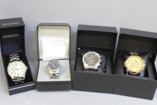 Four boxed wristwatches including Sekonda