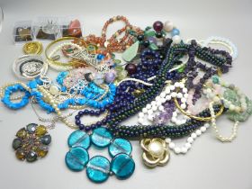 A collection of bead necklaces and bracelets including semi-precious stones, etc.