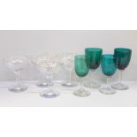 Four Babycham glasses and four coloured wine glasses **PLEASE NOTE THIS LOT IS NOT ELIGIBLE FOR