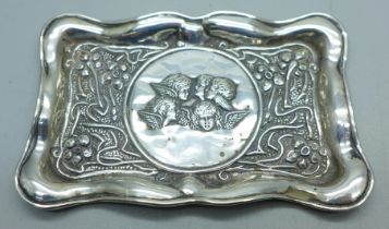 A silver pin or card tray with Reynolds Angels detail, Birmingham 1904, 34g, 6.5cm x 10.5cm