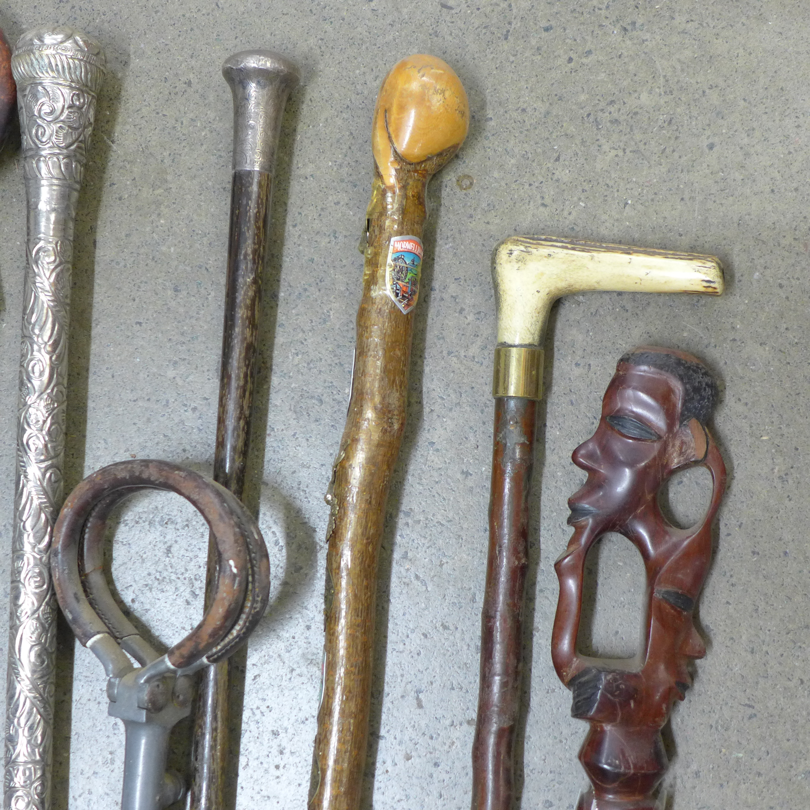 A collection of seven walking sticks including one with silver top and a shooting stick **PLEASE - Image 4 of 8